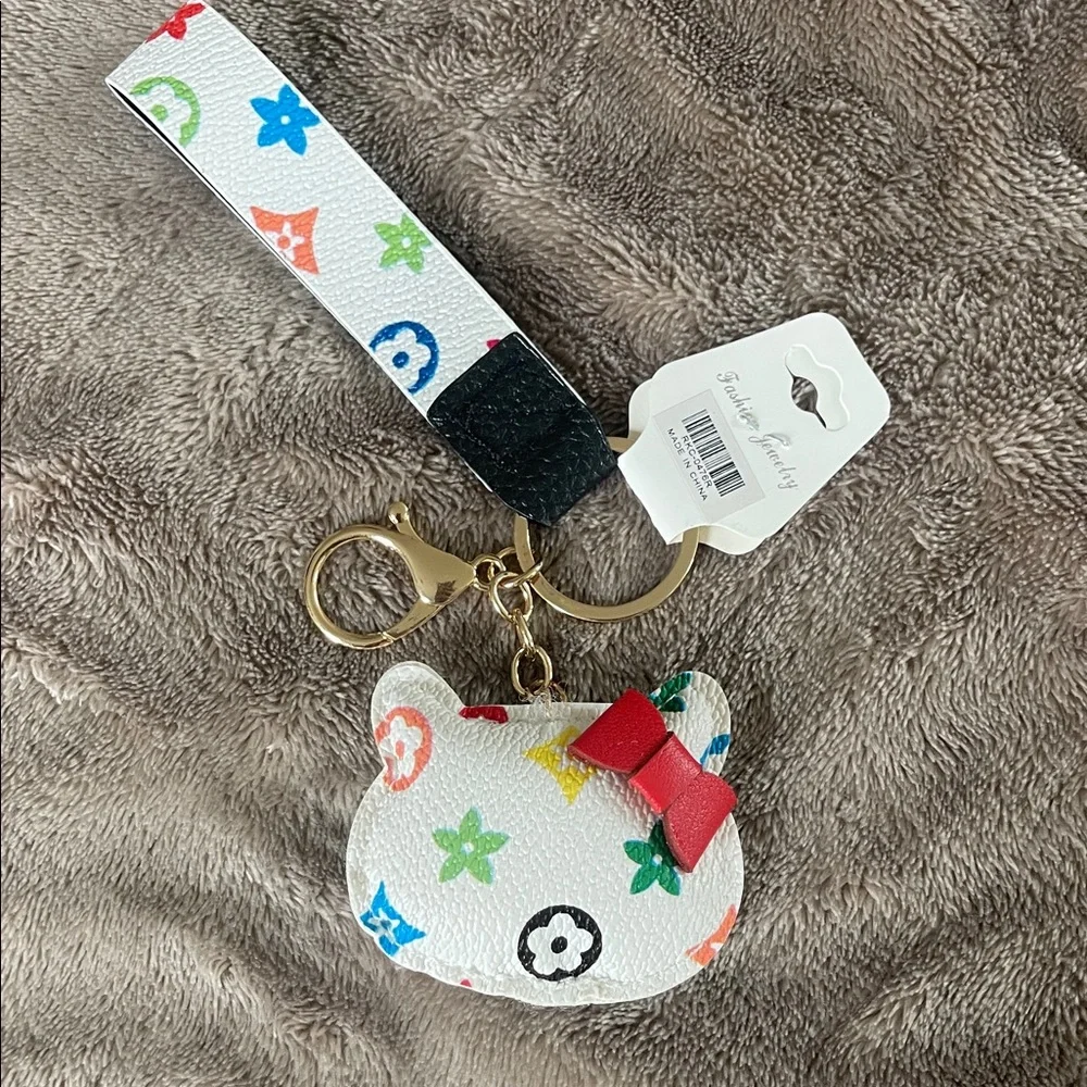 Hello Kitty multicolor luxury keychain purse Bag Charm with Red Bow nwt